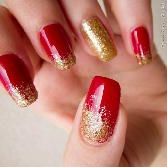 Giggling Gold in Red Nails