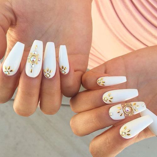 White Nails with Gold Embellishments and Rhinestones