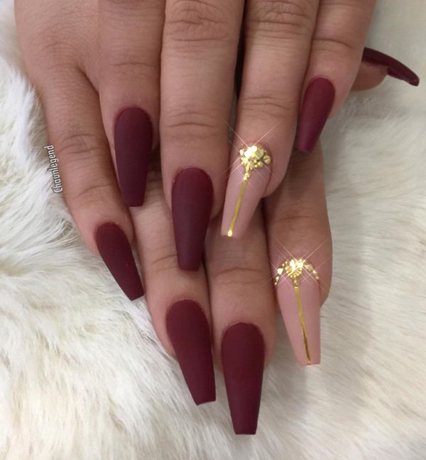 Golden Studs Accented Nails