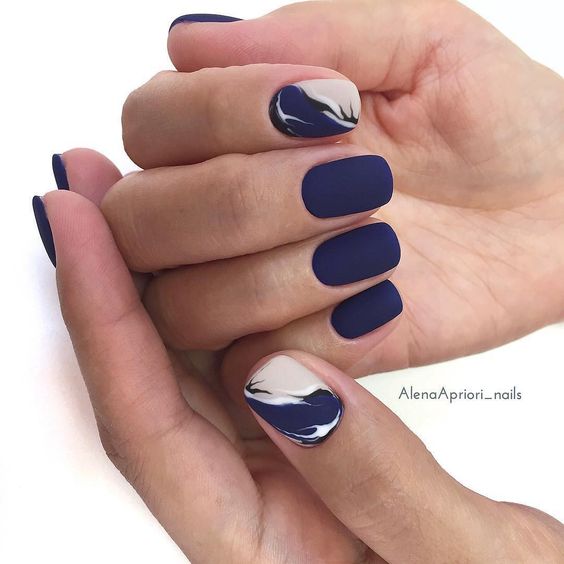 Water Marble Accent On Matte Blue Nails